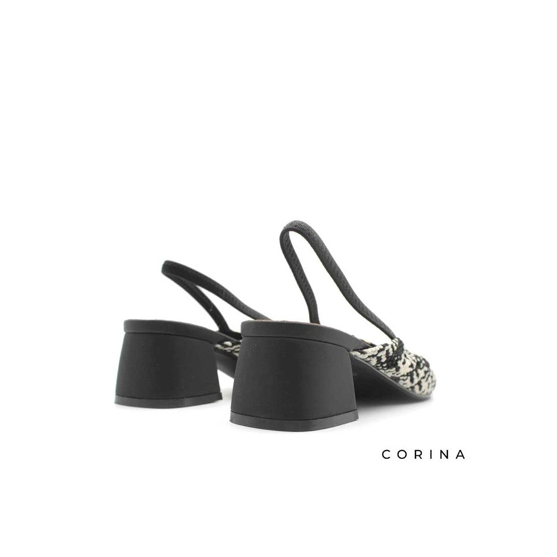 ZAPATO CALADO DESTALONADO BLANCO Y NEGRO CORINA