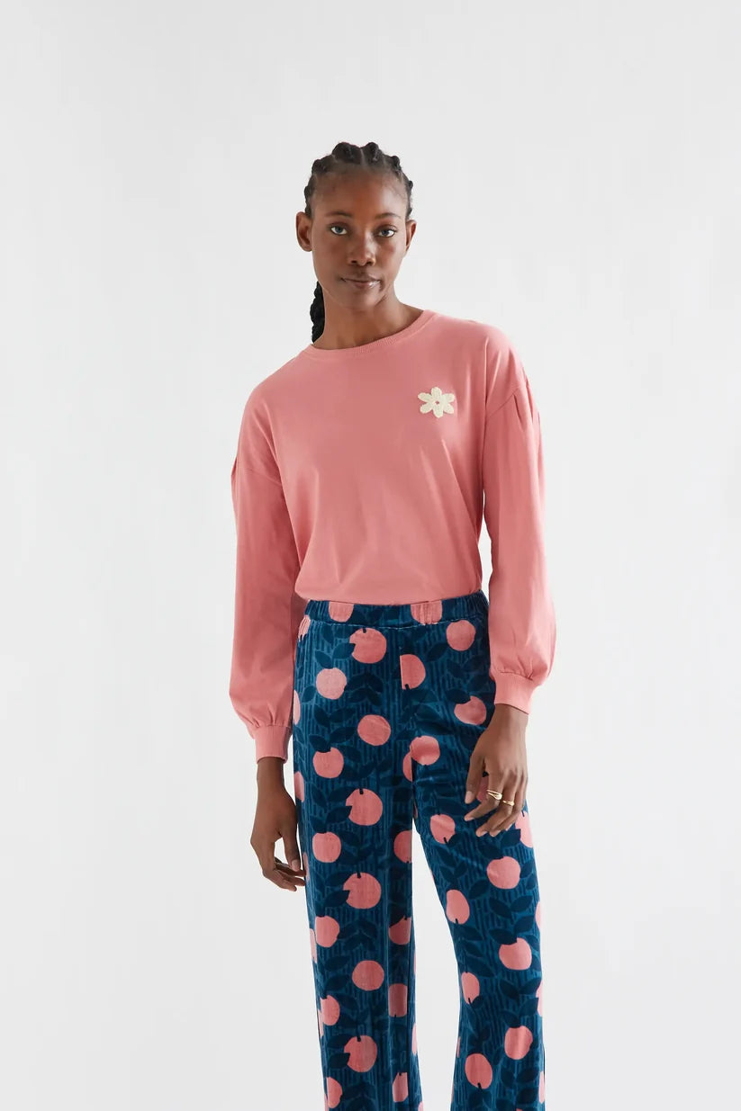 CAMISETA 100% ALGODÓN PARCHE FLOR COMPAÑÍA FANTÁSTICA